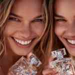 two models from hold crystal perfumes bottles and