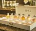 IRFE limited edition mini perfume samplers set in a high quality open white box on a vanity