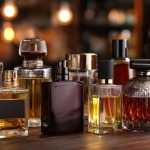 Ten different bottles of well-known luxury mens